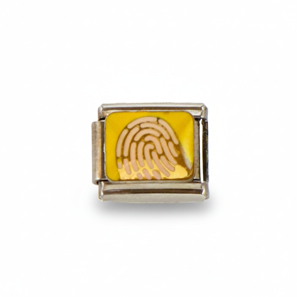 Charm colección amarilla (Huella)