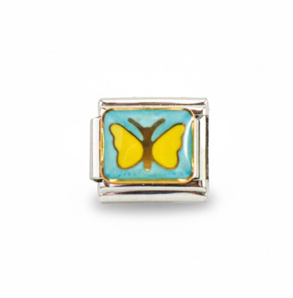 Charm colección amarilla (Mariposa)